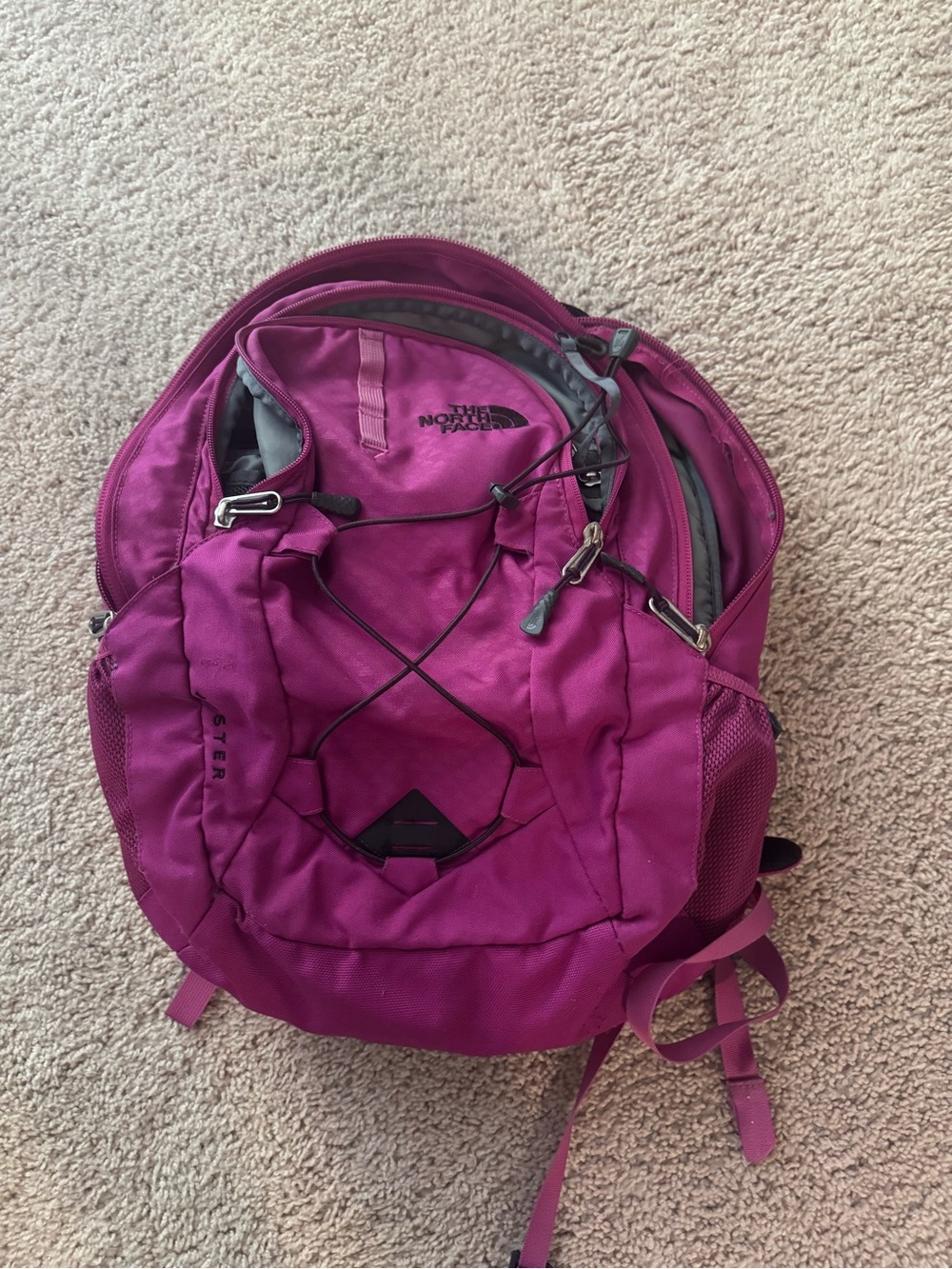 The North Face Magenta Women's Backpack with Bungee Front
